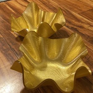 Set of two gold abstract bowls.